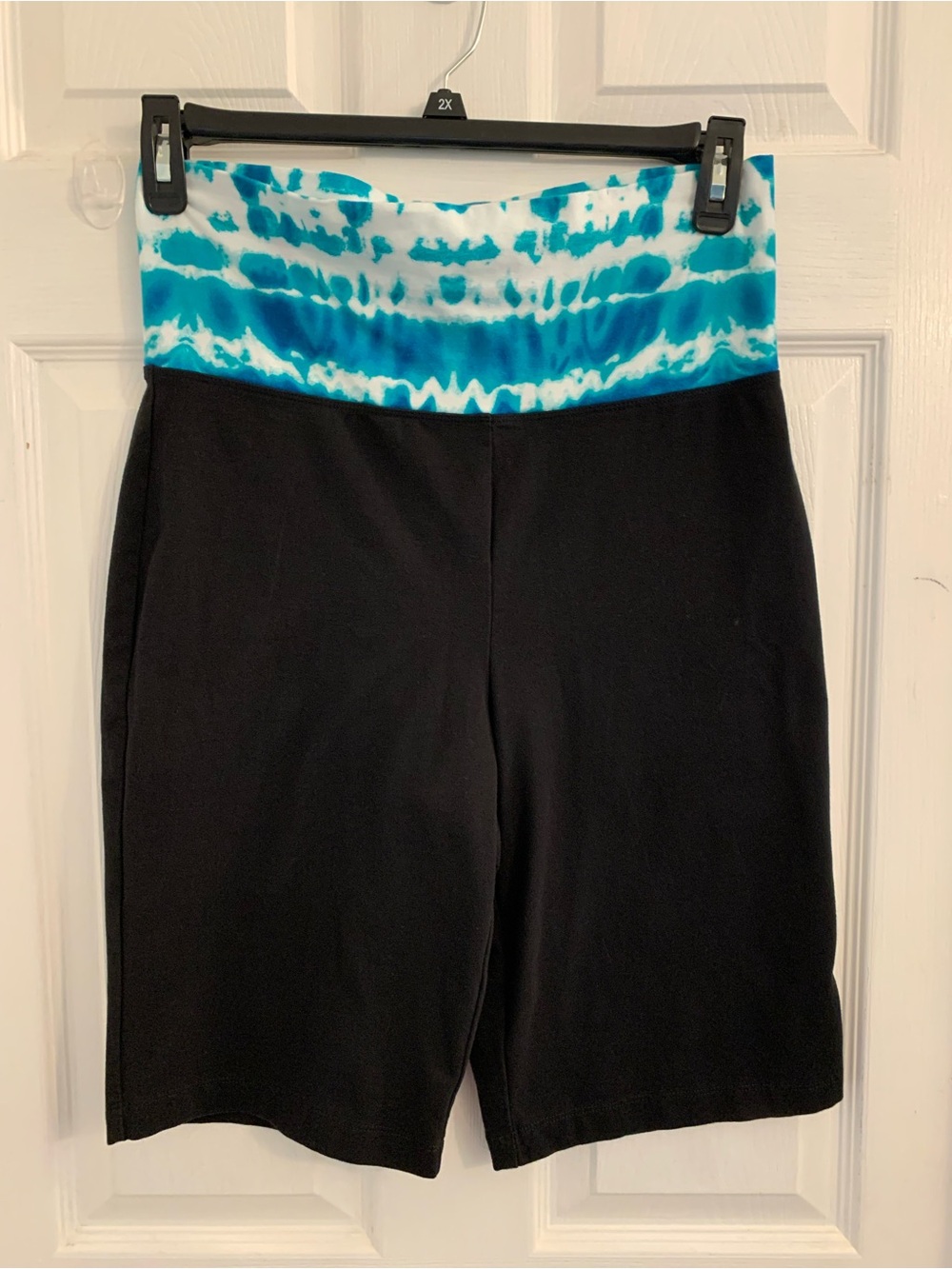 The Girls Black Bike Shorts with Teal Tie-Dye Waistband. Size Medium. $10